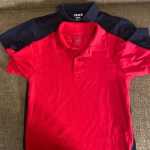 Boys IZOD uniform shirts - 1 red, 1 navy - size M 10/12